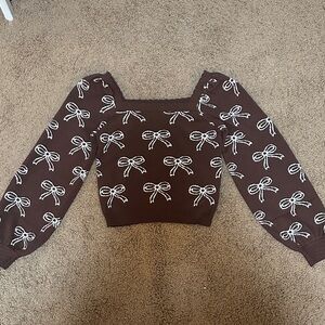 Elegant Brown Sweater with Bow Design